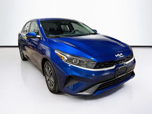 2023 Kia Forte LXS in Deep Sea Blue — front three-quarter view