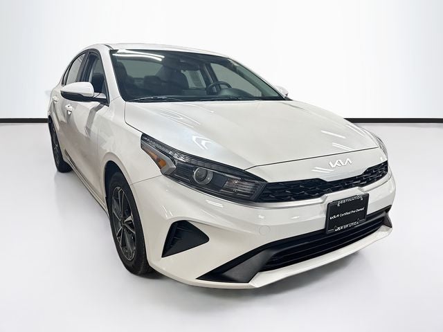 2024 Kia Forte LXS in Snow White Pearl — front three-quarter view