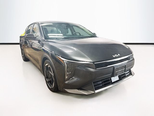 2025 Kia K4 EX in Interstellar Gray — front three-quarter view