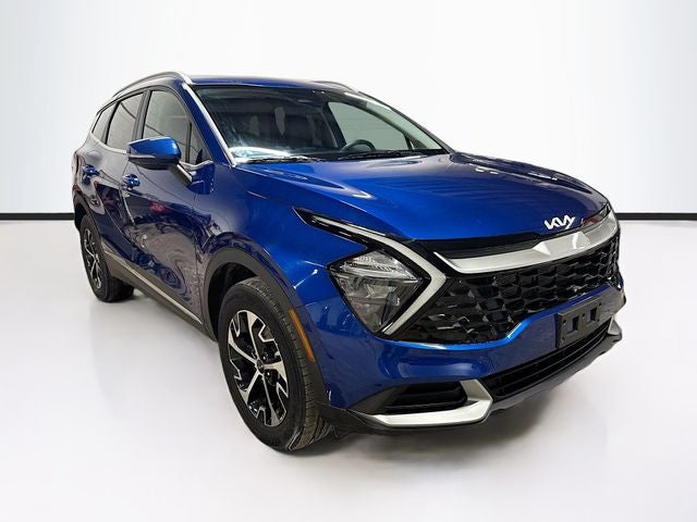 2023 Kia Sportage EX in Sapphire Blue — front three-quarter view