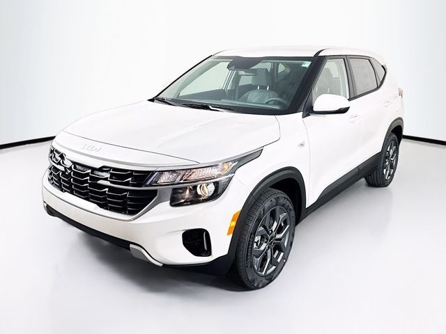 2026 Kia Seltos LX in Snow White Pearl — front three-quarter view