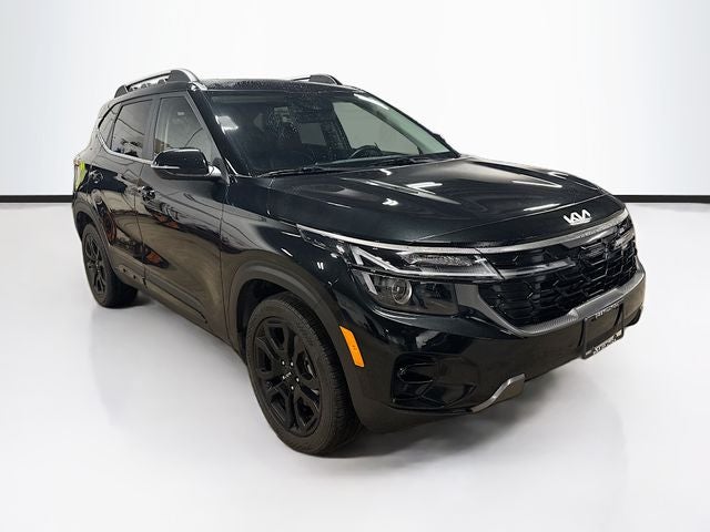 2024 Kia Seltos X-Line in Fusion Black — front three-quarter view