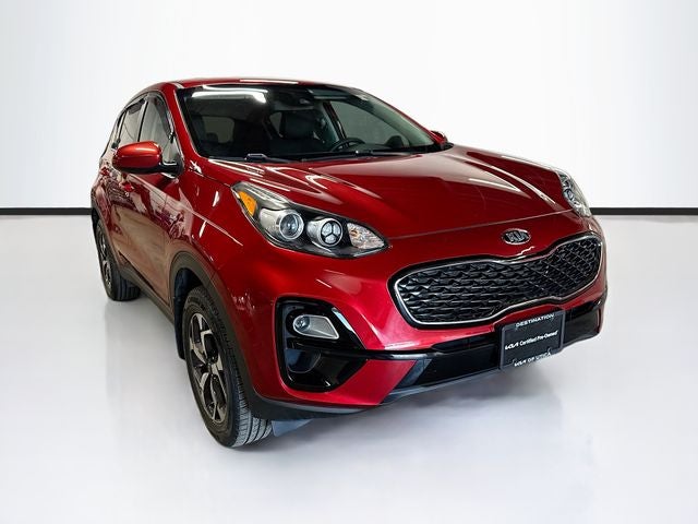 2020 Kia Sportage LX in Hyper Red — front three-quarter view